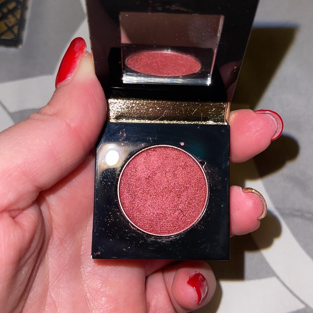 Beautiful red shimmer eyeshadow by Tarte in color Revel!